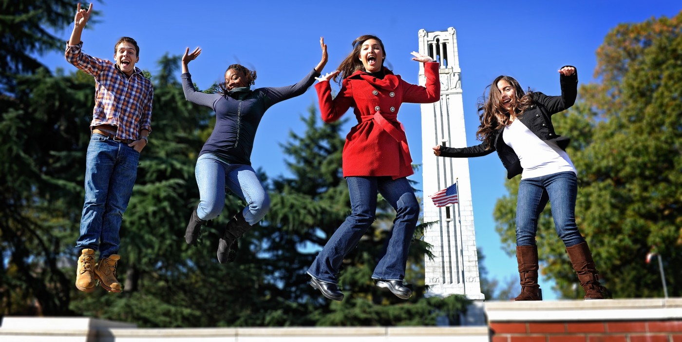 Welcome Students Jumping at Belltower